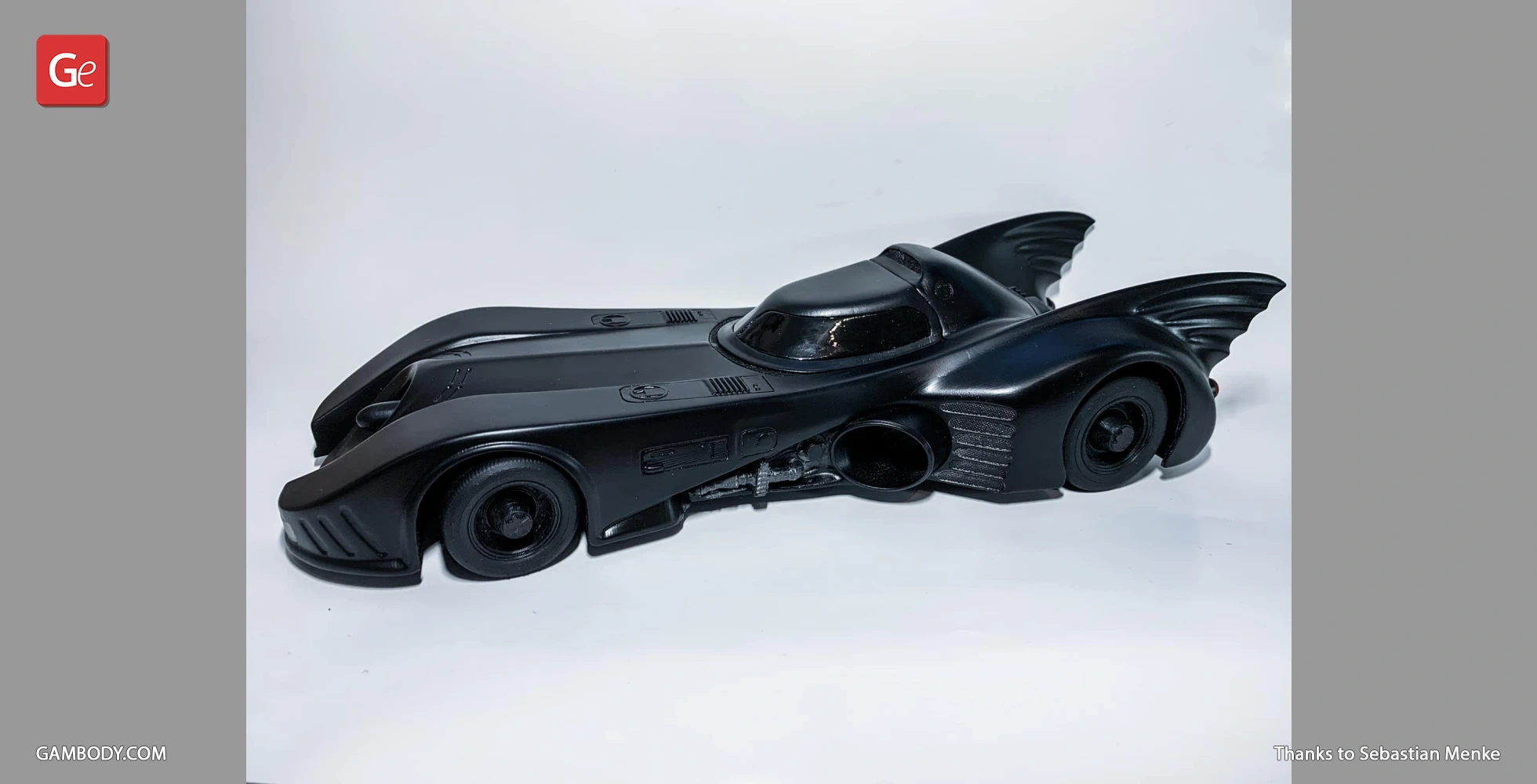 Sleek black Batmobile model with distinctive tail fins, based on the 1989 version, for 3D printing.