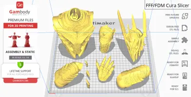 Golden 3D-printed parts of a fantasy armor bust, including a helmet, chest piece, and gauntlet.