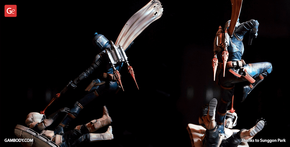 A dynamic diorama featuring Bo-Katan in action, leaping over a defeated opponent.