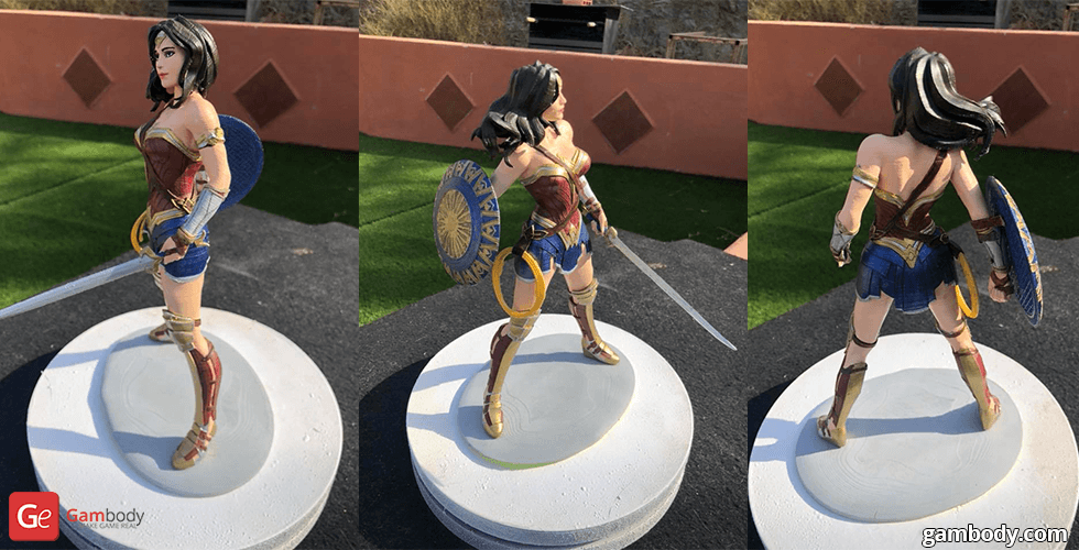 3D printed model of a warrior woman in armor with a sword and shield, standing on a round base.