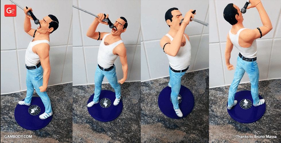 3D-printed figure of a man singing passionately with a microphone, wearing a tank top and jeans.